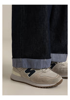 Jeans Wide Leg | Mezclilla Suave con Pespuntes Blancos y Dobladillo a Rayas